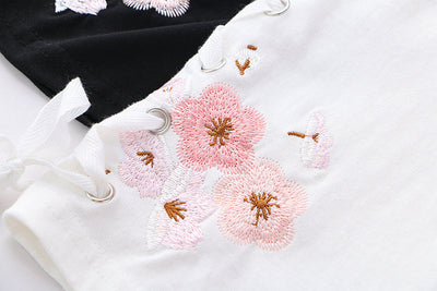 Camiseta Suelta de Algodón con Bordado Floral y Cordones para Mujer - Image 16