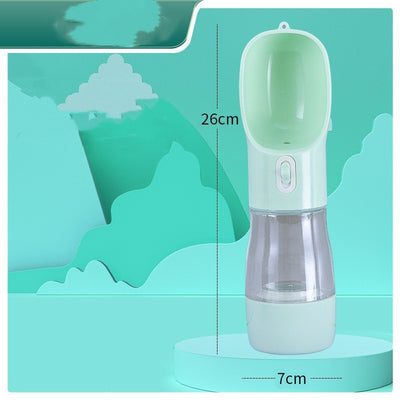 Pink portable pet water bottle with integrated feeder bowl, clear reservoir, and dispensing button for dogs. - Image 13