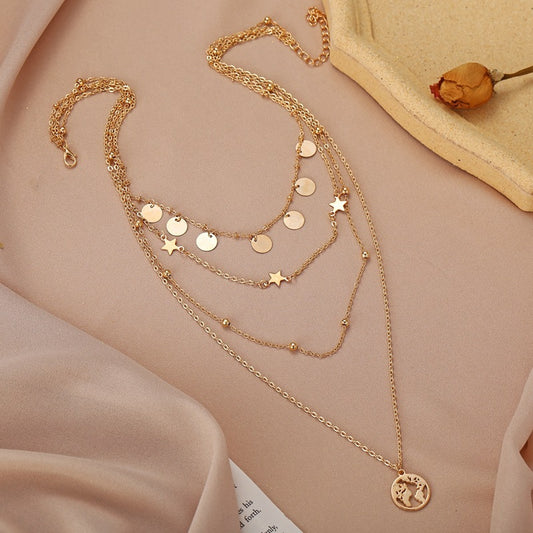 Collar Multicapa con Dije Estrella de Cinco Puntas