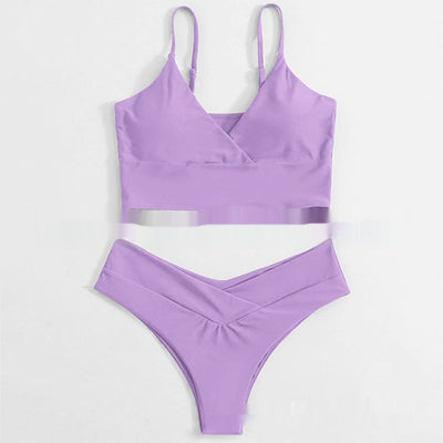 Bright yellow two-piece bikini swimsuit with a crop top and high-cut V-front bottoms, laid flat. - Image 8