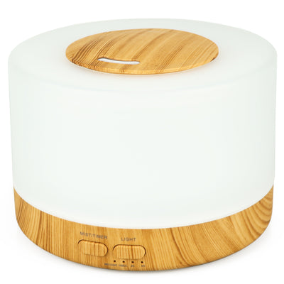 A cylindrical aromatherapy diffuser with a dark wood grain base and a translucent top glowing aqua blue, featuring control buttons. - Image 9