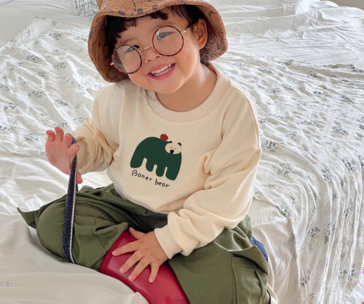 Matching cream crew neck sweatshirts, one adult and one child size, with a dark green bear graphic and "Boner bear" text. - Image 8