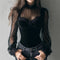 Blusa Negra de Encaje con Paneles de Malla y Detalles Calados