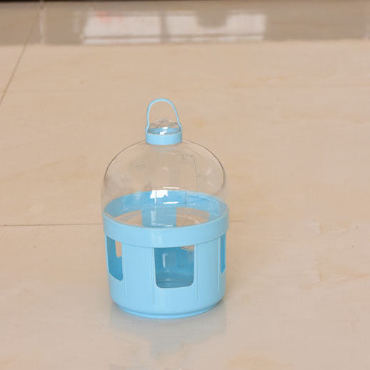 Transparent pet drinker with a light blue base and handle, designed for chickens or small birds.