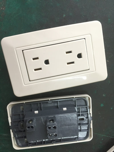 White American standard wall socket with two duplex outlets, providing six holes for electrical plugs. - Image 3