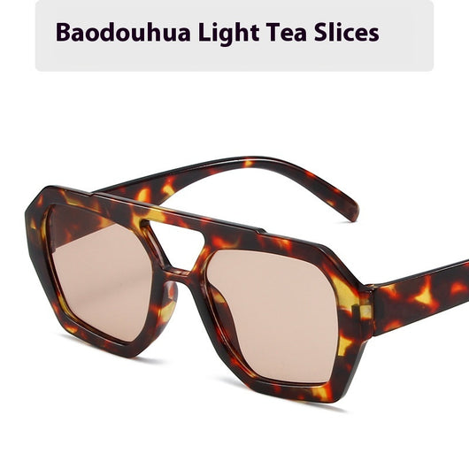 Minimalist square fashion sunglasses with a tortoiseshell frame and light brown lenses, angled view. - Image 7