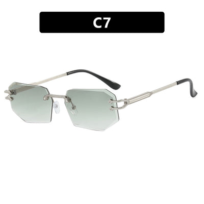 Rimless octagonal clear lens glasses with silver-toned metal temples and black ear tips, featuring decorative accents. - Image 6
