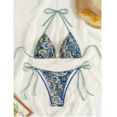 Female creative minimally printed split bikini set with a vibrant bohemian pattern and tie-side bottoms. - Image 2