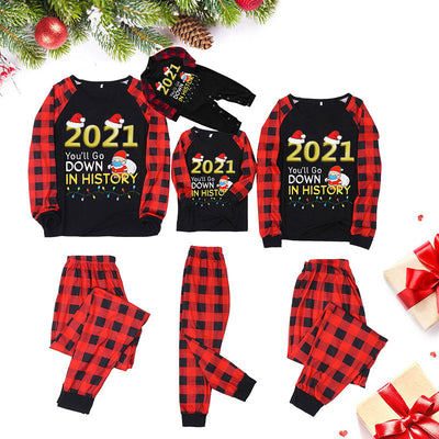 Red and black plaid long-sleeve pajama set with a '2021 You'll Go Down In History' graphic featuring a masked Santa.