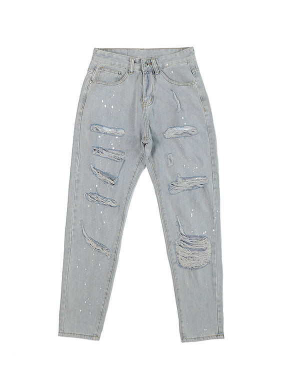 Distressed Slim Fit Jeans with Strategic Rips and Ink Effect