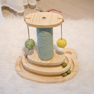 White cat playing with a wooden multi-level track toy featuring a spring-mounted yellow feather ball and a green catnip ball. - Image 22