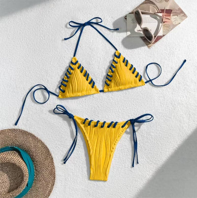 Light blue ribbed bikini swimsuit with pink tie straps and lacing detail, featuring a triangle top and thong bottom. - Image 27
