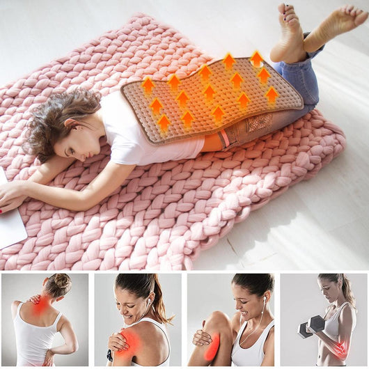Gray quilted electric heating pad with a white wired controller and power plug, partially rolled up. - Image 6