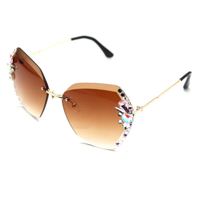 Women's frameless sunglasses with brown gradient lenses and colorful rhinestone embellishments on gold metal temples. - Image 5