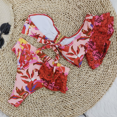 Women's one-shoulder ruffled bikini with a vibrant red and pink floral print, high-waisted bottoms. - Image 13
