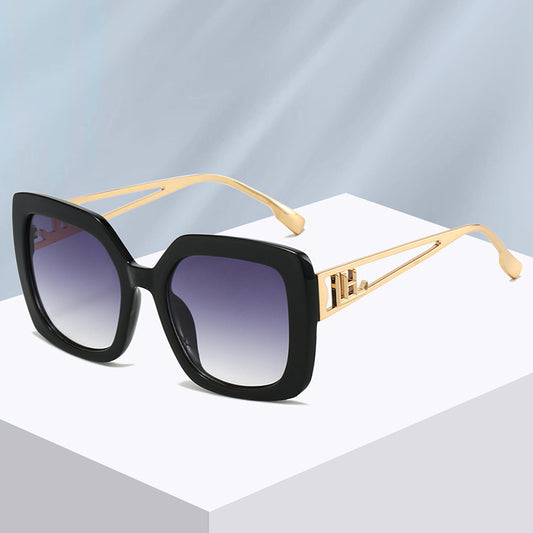 Women's square fashion sunglasses with red and green gradient tortoise shell frames and gradient purple-to-yellow lenses.