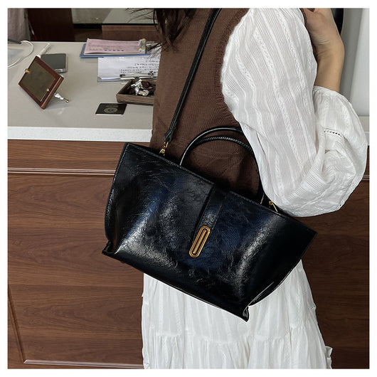 Bolso Bucket de Cuero Encerado Elegante y Portátil - Image 40
