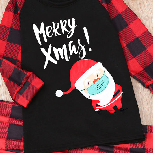 Family matching Christmas pajamas with black tops, red plaid sleeves, and Santa wearing a mask, paired with red plaid pants. - Image 9