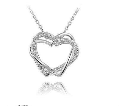 Elegante Conjunto de Collar y Aretes Doble Corazón Brillante - Image 8