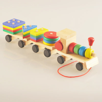Wooden toy train with a locomotive and two carriages, each carrying colorful shape-sorting blocks. - Image 3
