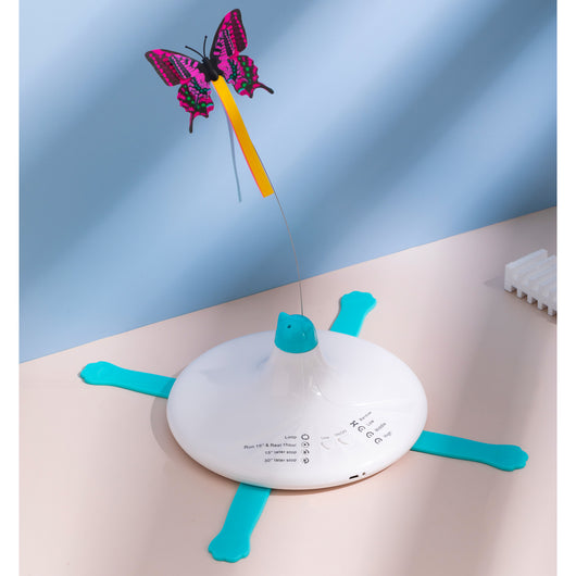 Rechargeable automatic rotating cat toy with a white base, teal paw-shaped feet, and a pink and black butterfly. - Image 10