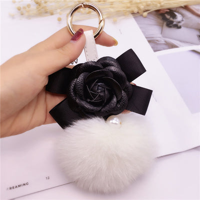 Llavero Decorativo Flor Camelia con Moño para Bolsa de Mujer - Image 10