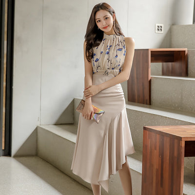 Conjunto Elegante: Blusa Sin Mangas Estampada y Falda Tableada con Abertura - Image 4