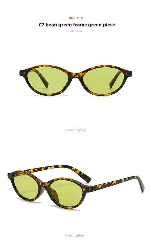 Retro fashion small frame sunglasses with translucent brown frames and yellow oval lenses, viewed from an angle. - Image 18