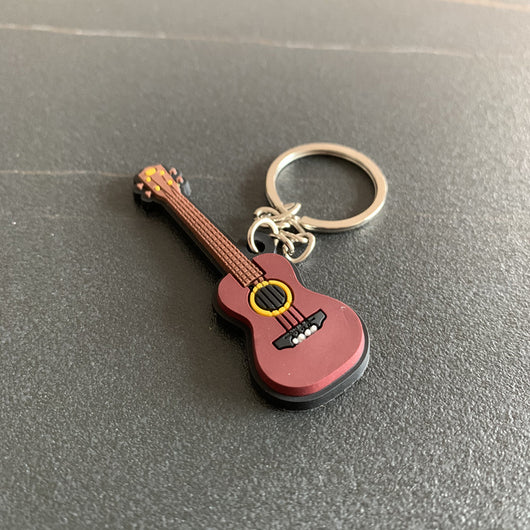 Llavero Guitarra de Silicona - Accesorio Musical Versátil - Image 5