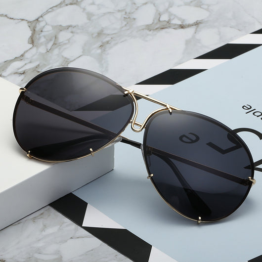 Aviator sunglasses with light blue lenses and a gold-colored metal frame, featuring a double bridge design. - Image 20