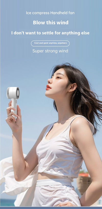 Obsidian black handheld fan with gold accents, digital display, and semiconductor ice cooling for high-speed cool air. - Image 21