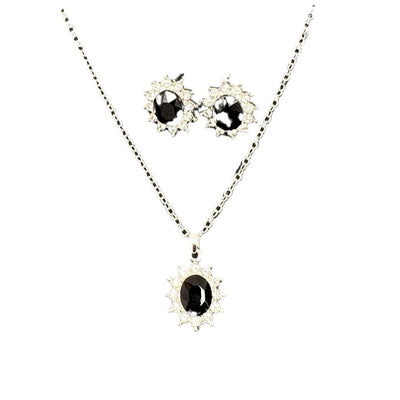 Iridescent teardrop pendant necklace with matching stud earrings, featuring clear accent stones and silver-tone metal. - Image 5