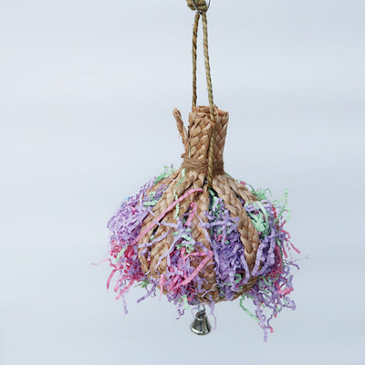 Woven straw paper parrot toy filled with colorful shredded paper, featuring a small bell at the bottom. - Image 4