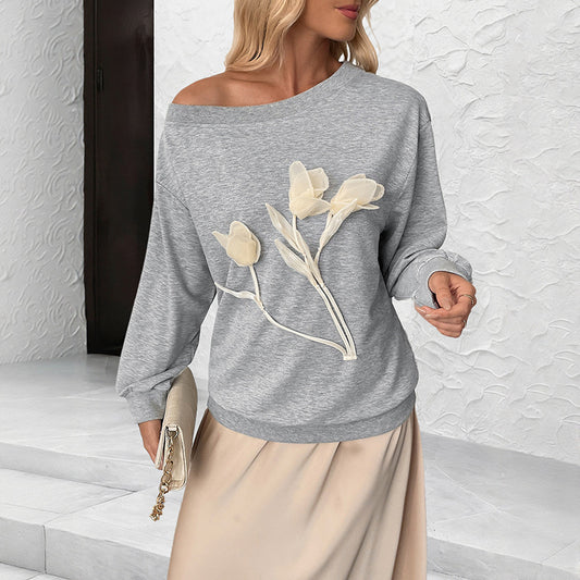 Blusa Elegante con Flores 3D y Hombros Descubiertos