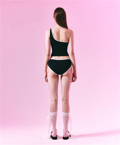 Women's light purple one-shoulder swimsuit with dark red contrast trim, lying on a striped blanket on green grass. - Image 15