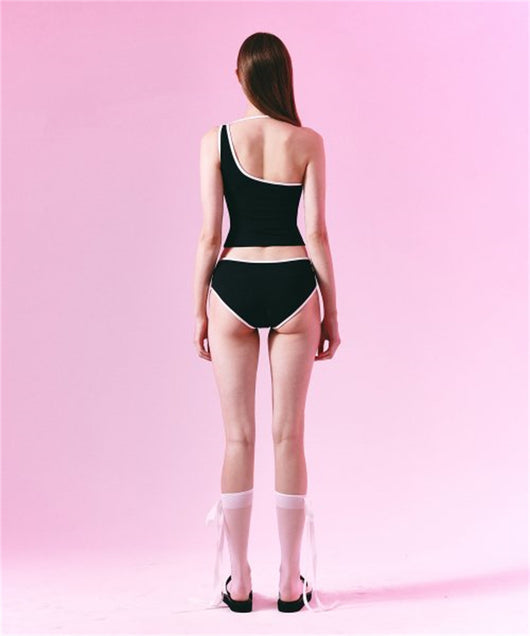 Women's light purple one-shoulder swimsuit with dark red contrast trim, lying on a striped blanket on green grass. - Image 15