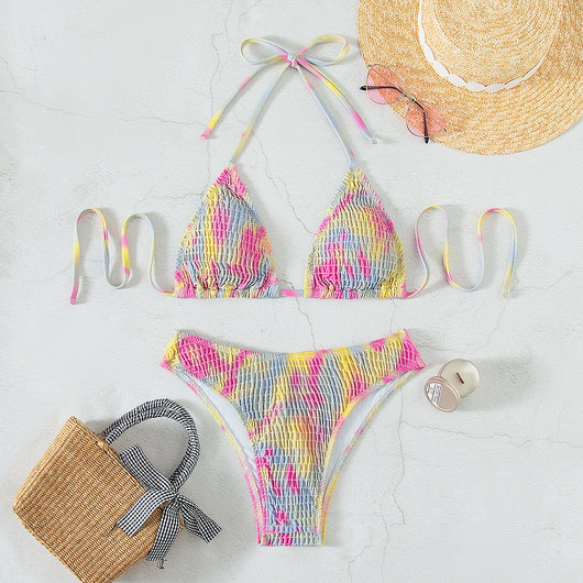 Multicolor tie-dye ruched two-piece swimsuit with a triangle bikini top and matching high-cut bottom. - Image 2