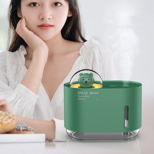 White square humidifier with a clear base, featuring a cute white bear figure in a clear dome, labeled "SPACE BEAR Humidifier 300 ml".