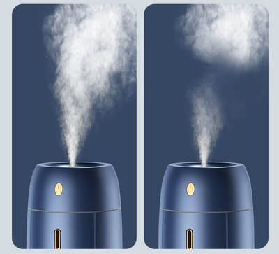 White cylindrical household humidifier with a visible water level indicator, next to its brown cardboard packaging. - Image 17