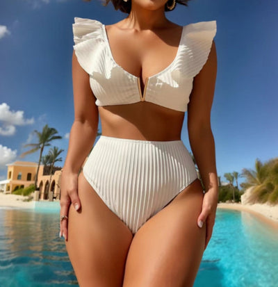 White ribbed bikini with ruffled shoulder straps and high-waisted bottoms on a model at a tropical beach. - Image 6