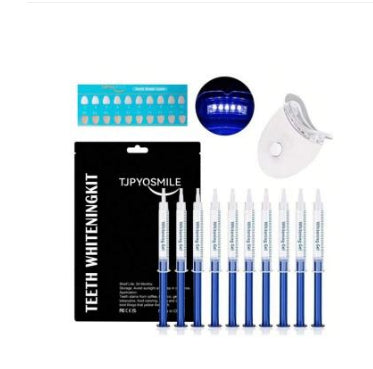 Teeth whitening kit with a blue LED light mouthpiece and a syringe of whitening gel on a white background. - Image 12