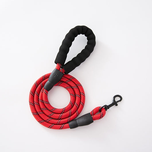 Red and black dog harness with reflective strips, adjustable straps, and a top handle for secure pet control. - Image 35