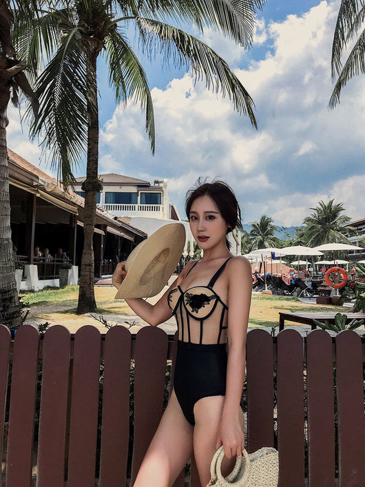 Black and nude lace bodysuit with floral embroidery, mesh panels, underwire cups, and adjustable straps. - Image 12