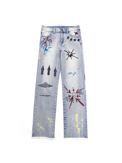 Jeans Azules con Bordado Graffiti y Detalles Deshilachados - Image 3