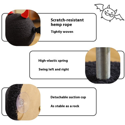 Black cat scratching toy with a sisal-wrapped ball, red devil horns, and black bat wings on a spring base. - Image 3