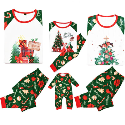 Green baby Christmas pajama romper with red trim, featuring candy canes, ornaments, gingerbread men, and poinsettias. - Image 14