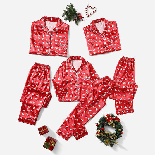 Three dark blue family pajama sets with white and light blue snowflake patterns, featuring long-sleeve tops and pants. - Image 30