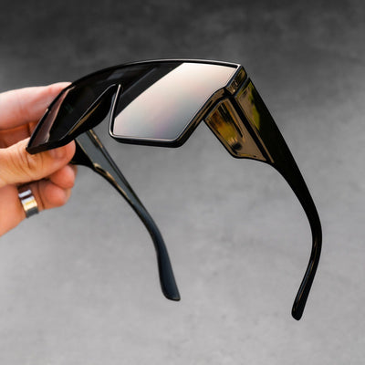 Black frame sports cycling sunglasses with vibrant purple polarized shield lenses, ideal for biking and outdoor activities. - Image 3