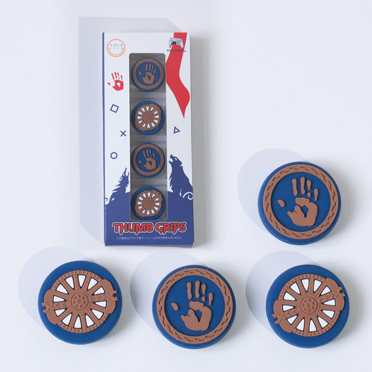Blue silicone controller cover with white accents and wolf graphic, paired with thumb grips featuring handprint and gear designs. - Image 2