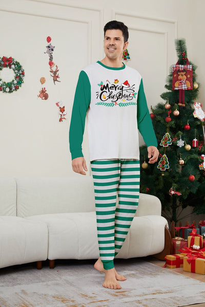 Family of four wearing matching green and white striped Christmas pajamas with "Merry Christmas" graphic. - Image 8